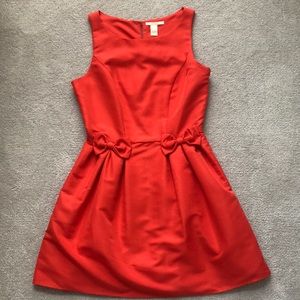 Orange A-line dress with bow detail